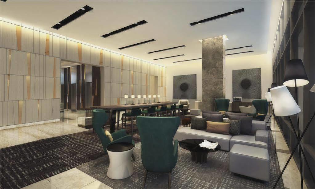 Seda Vertis North Quezon City Eksteriør billede The lobby of the hotel